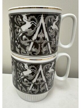 Pair of MCM Chinese Unicorn Stacking Coffee Mugs Black And White Gold Trim 3”